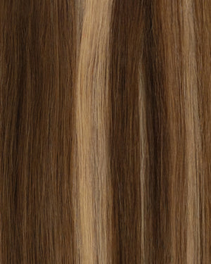 Blonde and brown highlighted hair extensions with a cool natural finish