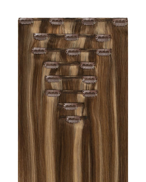 Brown hair extensions with blonde highlights in a cool toned chestnut shade