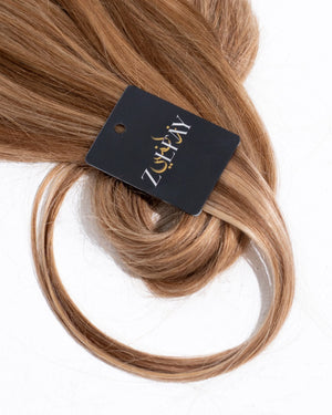 clip in hair extension sample in golden brown with beige blonde highlights