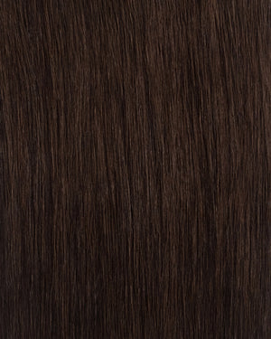 dark brown clip in hair extensions adding thickness and volume