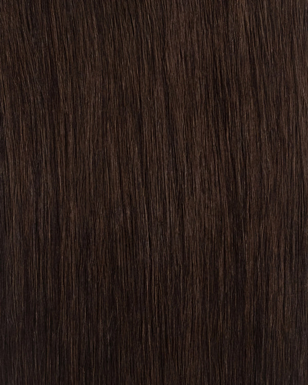 dark brown clip in hair extensions adding thickness and volume