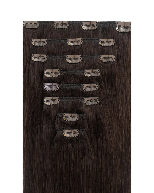 dark brown clip in hair extensions made from soft human hair for a natural look