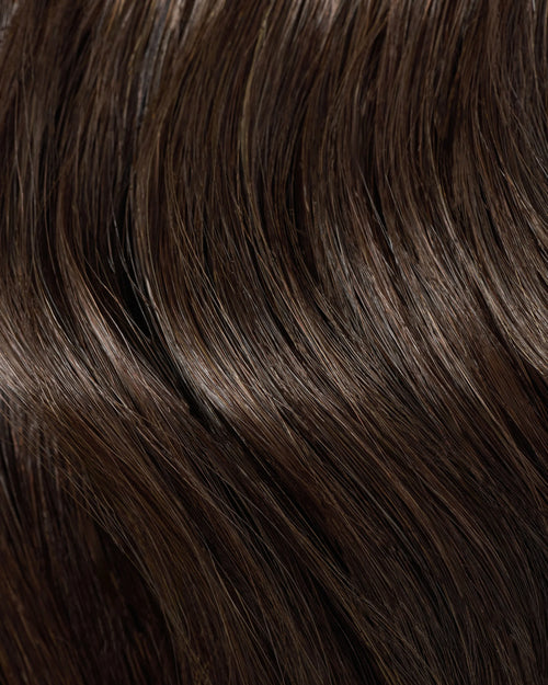 dark brown hair extensions with smooth texture and seamless blend