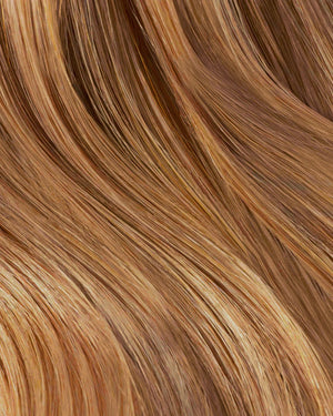 golden brown hair extensions with smooth texture and seamless blend