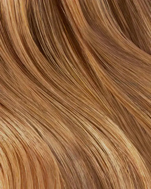 golden brown hair extensions with smooth texture and seamless blend