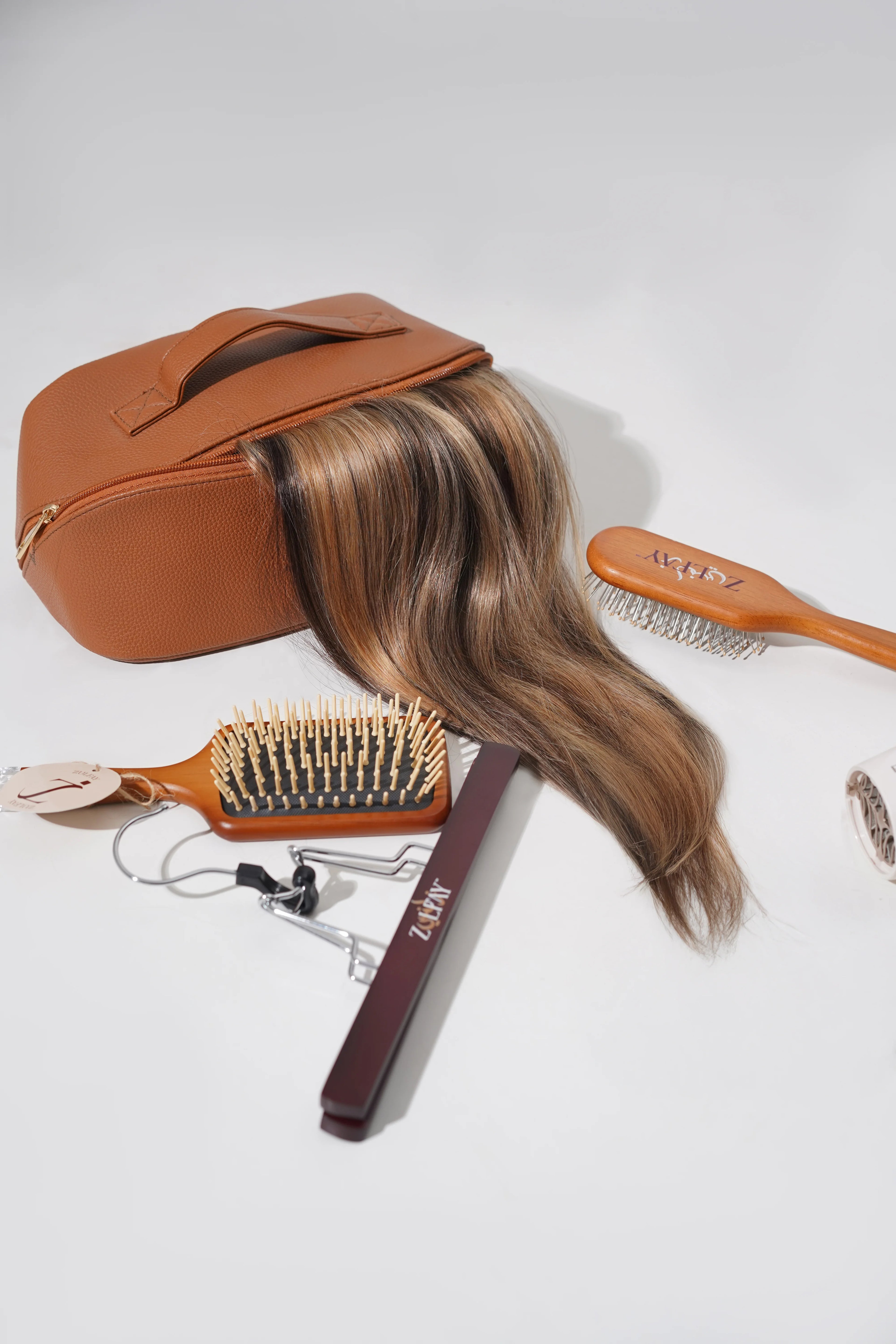 human vs synthetic hair extensions comparison showing benefits of remy human hair